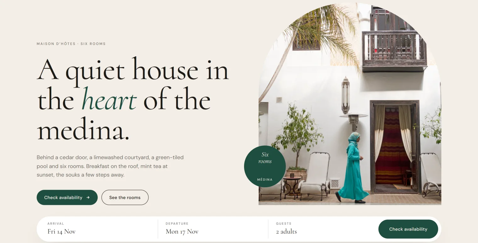 The Dar Inou home page on a computer: a quiet house in the heart of the medina, the courtyard in an arch, and the booking bar under it