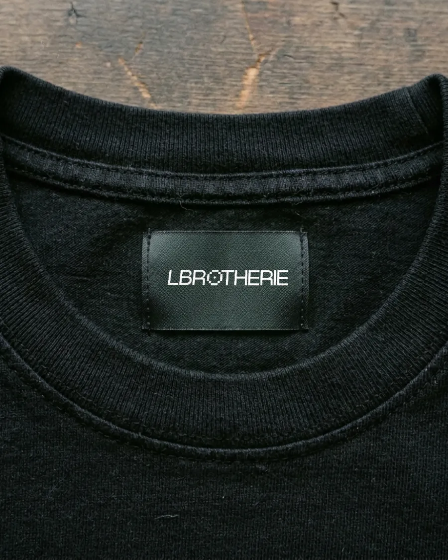 ملصق Lbrotherie المنسوج الأسود داخل ياقة قميص
